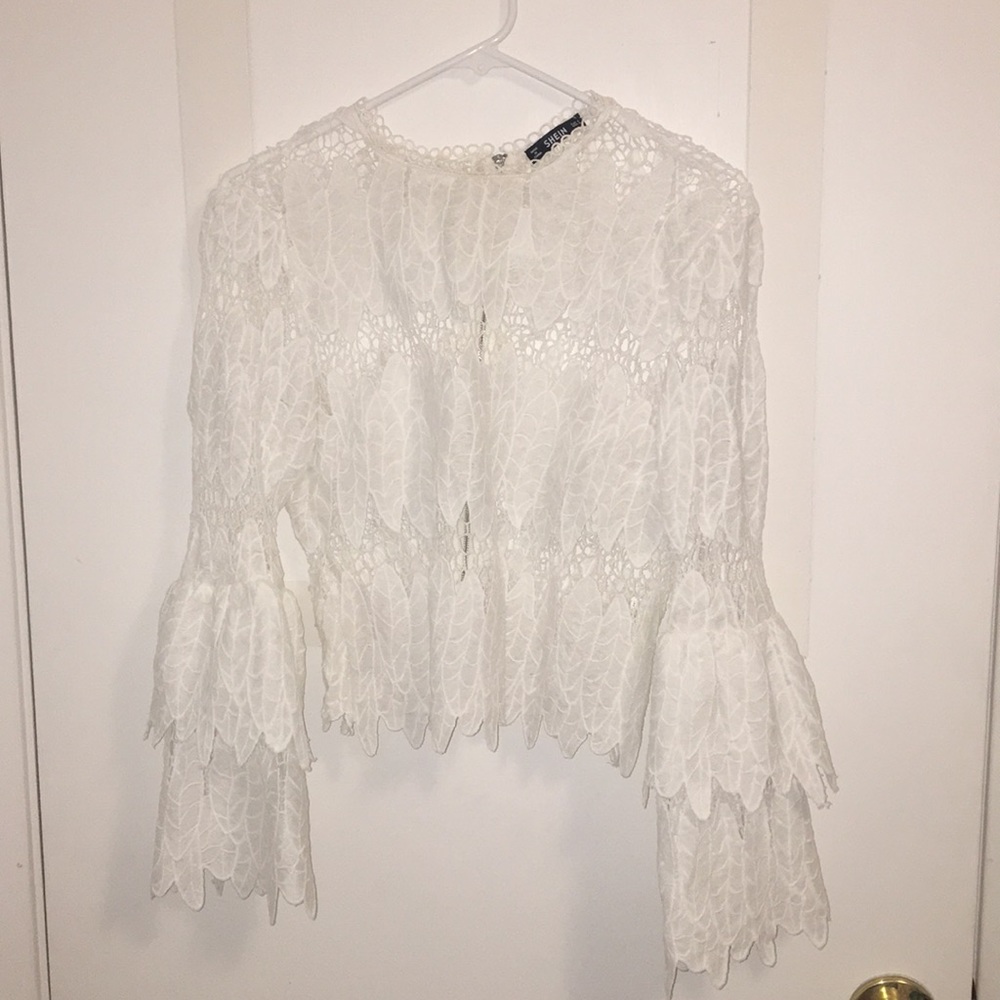 Long sleeved white lace shirt